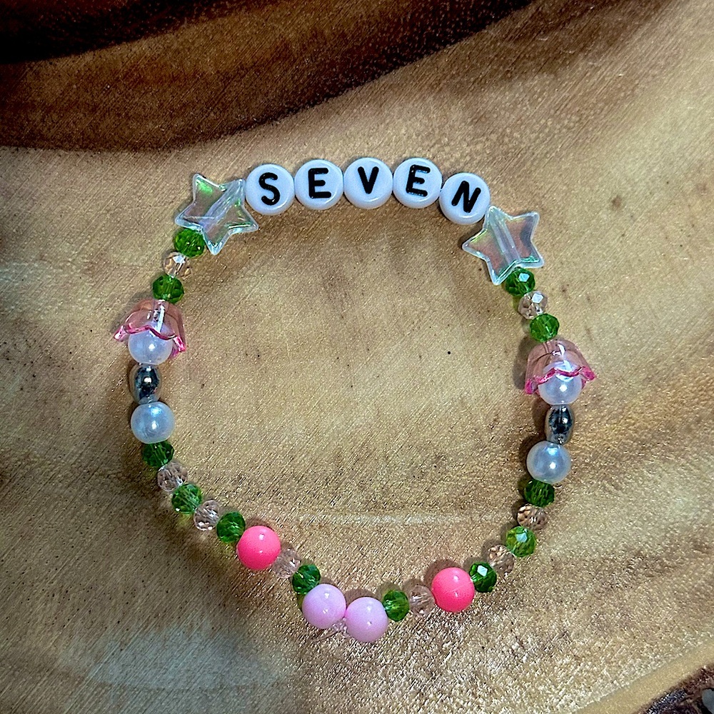 5 for $20 Taylor Swift Handmade Friendship Beaded Bracelet
“Seven”